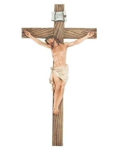 Wooden cross with a detailed Jesus figure on a white background