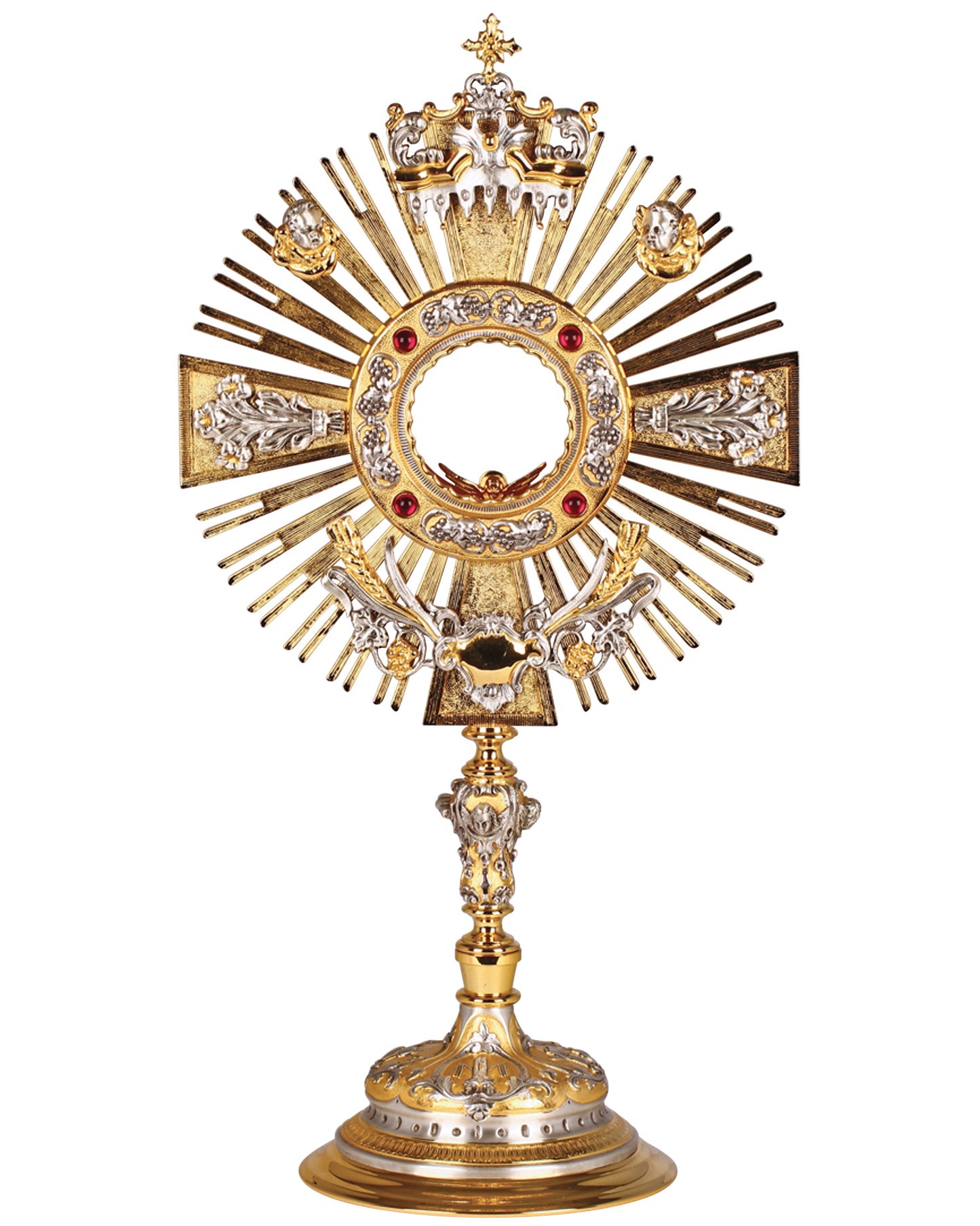 Decorative gold cross with intricate designs on a white background