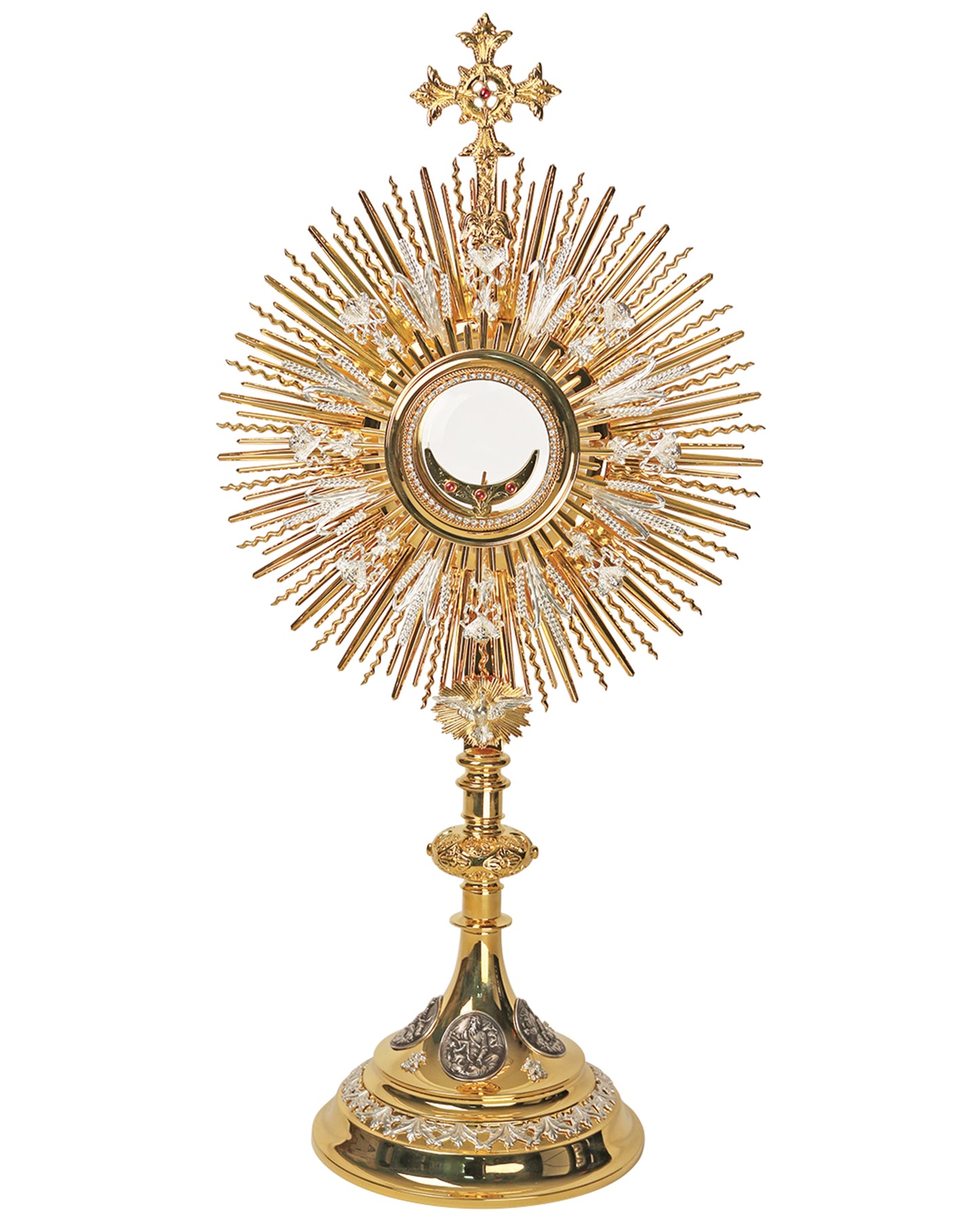 Decorative gold monstrance with intricate design on a white background