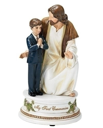Statue of a man in a white robe and a boy in a suit with 'My First Communion' text on a white background
