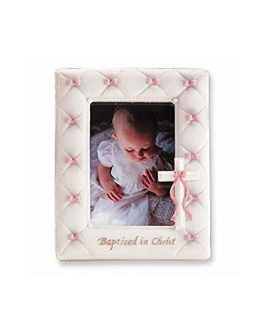 Decorative photo frame with a baby picture and 'Baptized in Christ' text on a white background