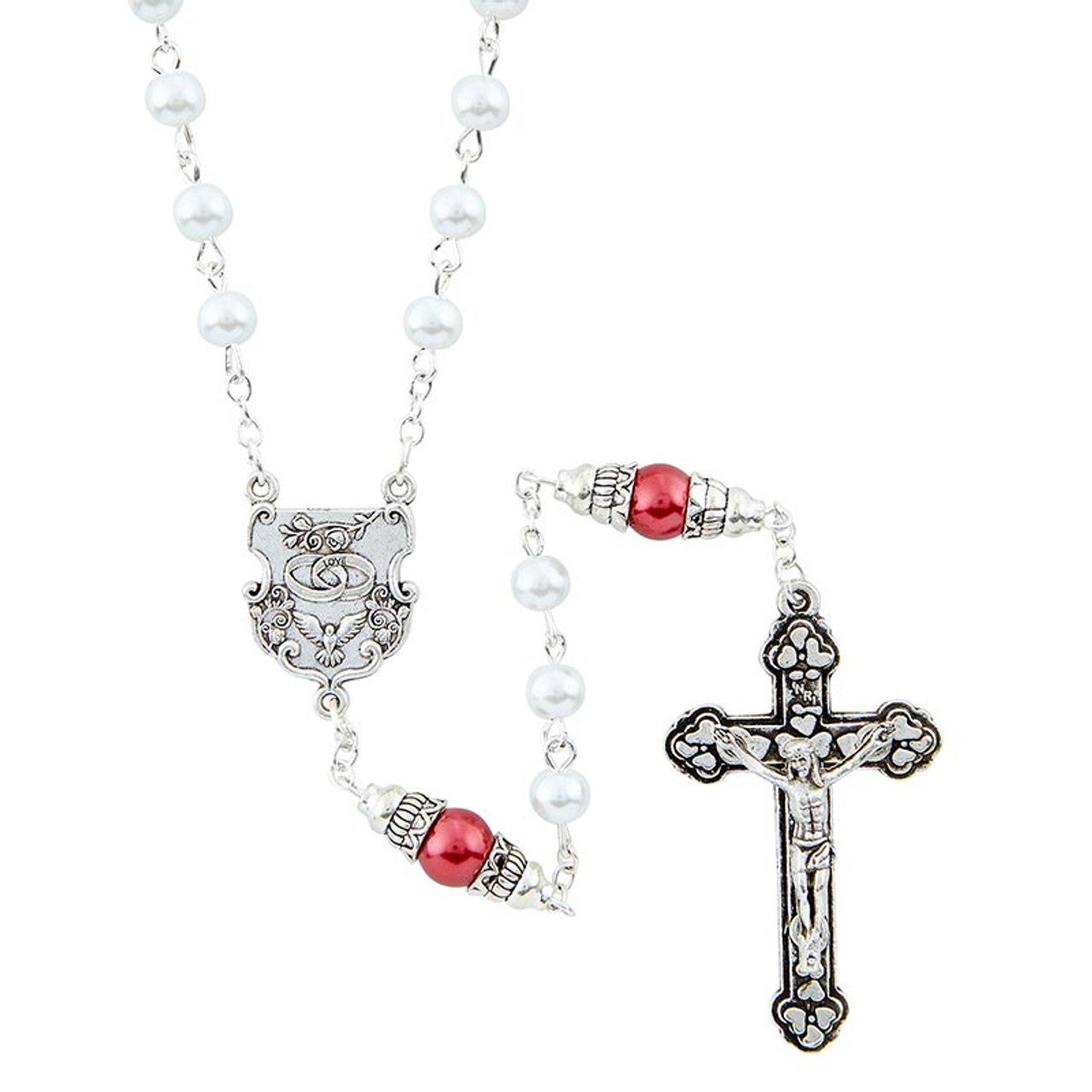 A wedding rosary with white glass pearl beads, blush beads with 'Our Father' inscription, and a silver crucifix.