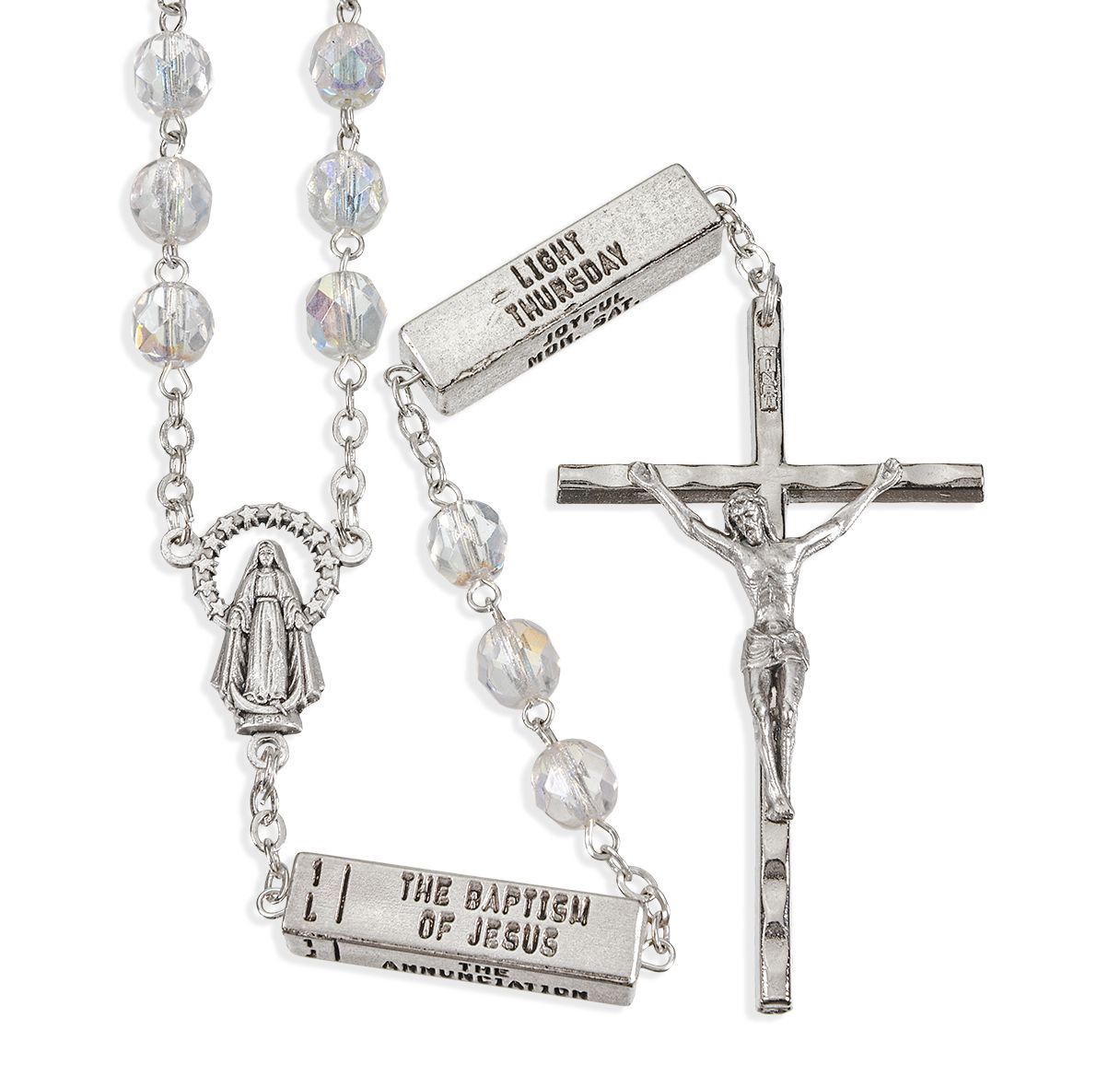 Silver rosary with beads and crucifix on a white background
