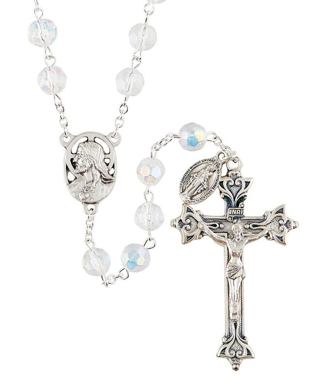A silver-colored metal rosary with clear fire-polished beads and a silver oxidized crucifix, featuring the Miraculous Medal.