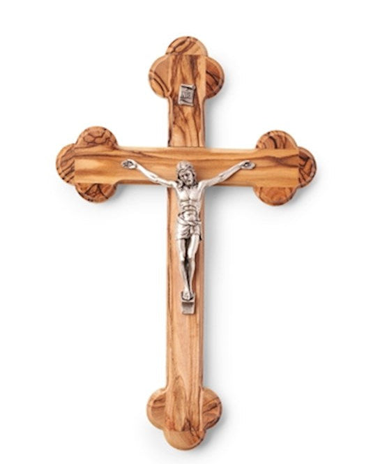 Wooden crucifix with Jesus figure on a white background