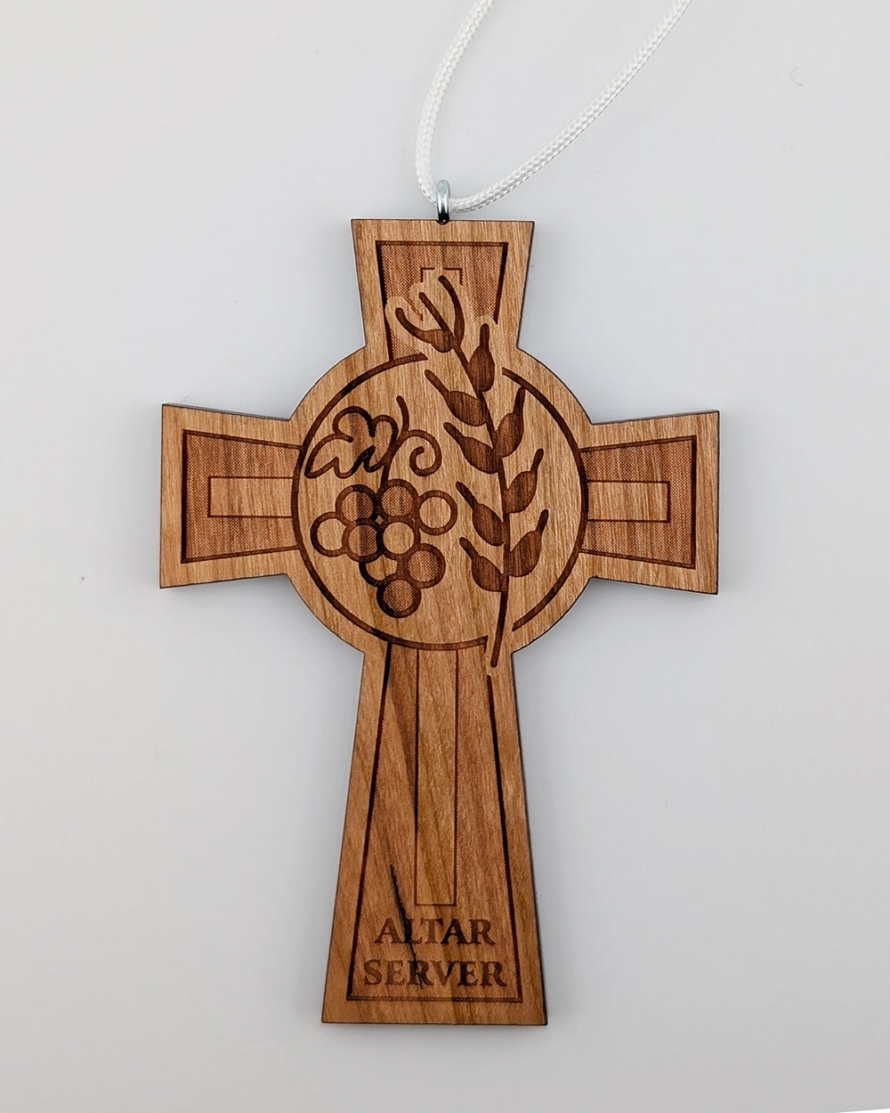 Wooden cross pendant with engraved design and 'Altar Server' text on a light gray background