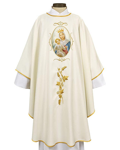 A white chasuble with a gold-embroidered image of Mary Queen of Heaven and gold lace trim.