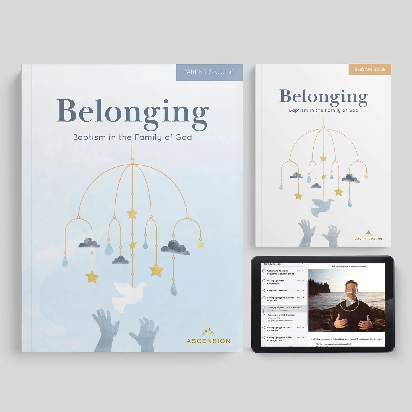 Two books titled 'Belonging' by Ascension on a gray background with a tablet displaying a video.