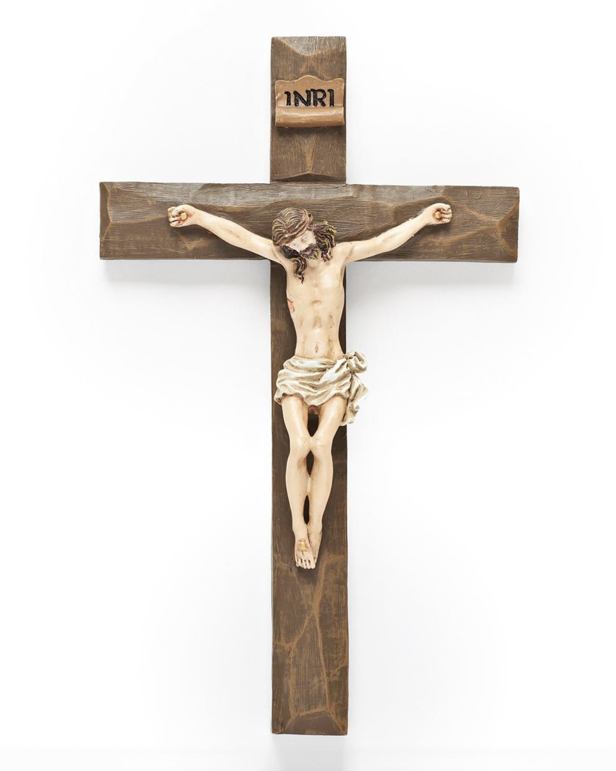 Wooden crucifix with Jesus Christ figure on a white background