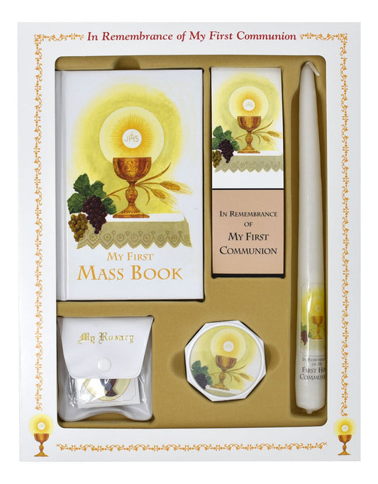 First Communion gift set with Mass Book, candle, and other items in a decorative box.