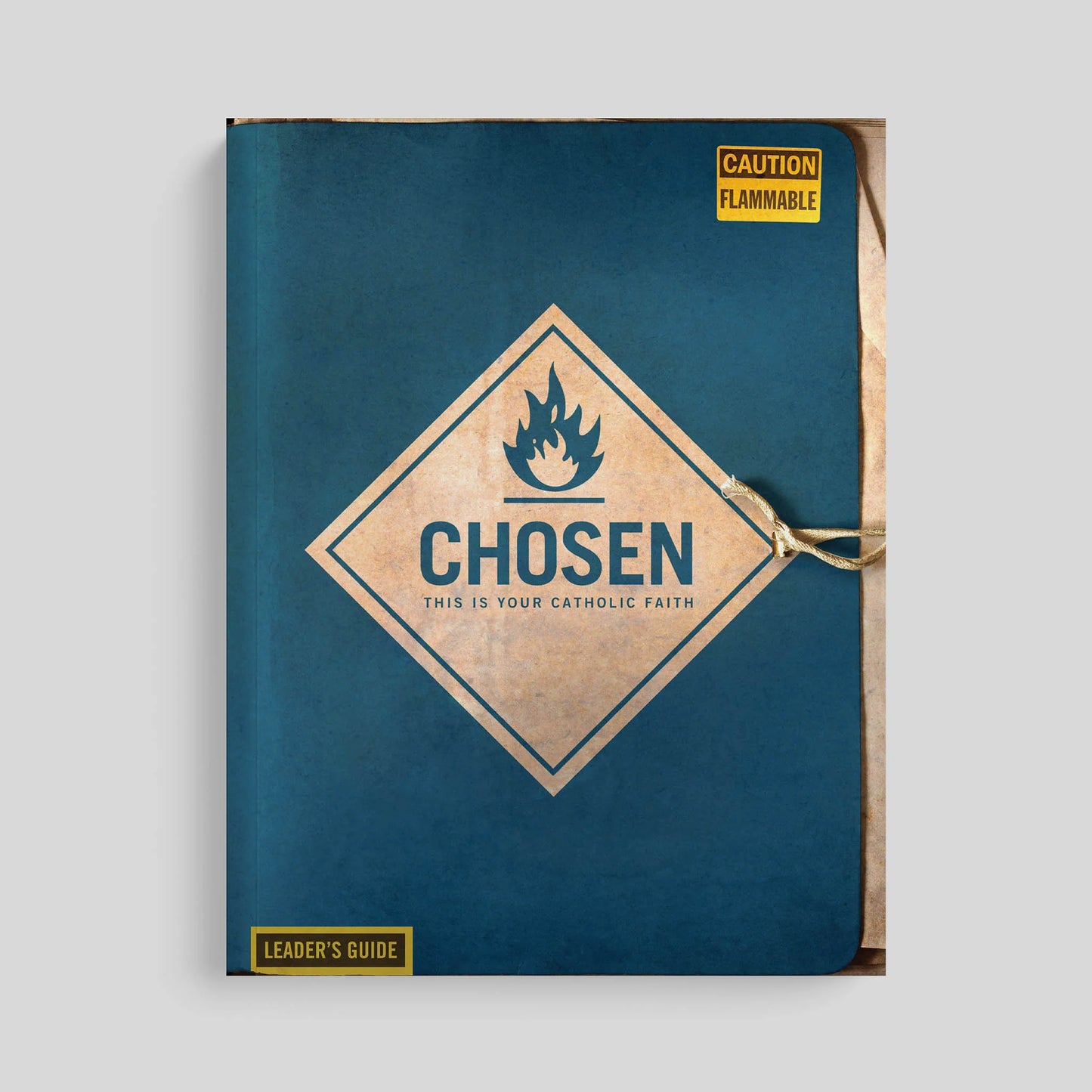Book titled 'Chosen: This is Your Catholic Faith' with a flame symbol on a blue cover.