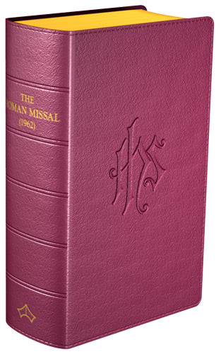 A red leather bound book titled 'The Roman Missal (1962)' with gold accents and an embossed floral design.