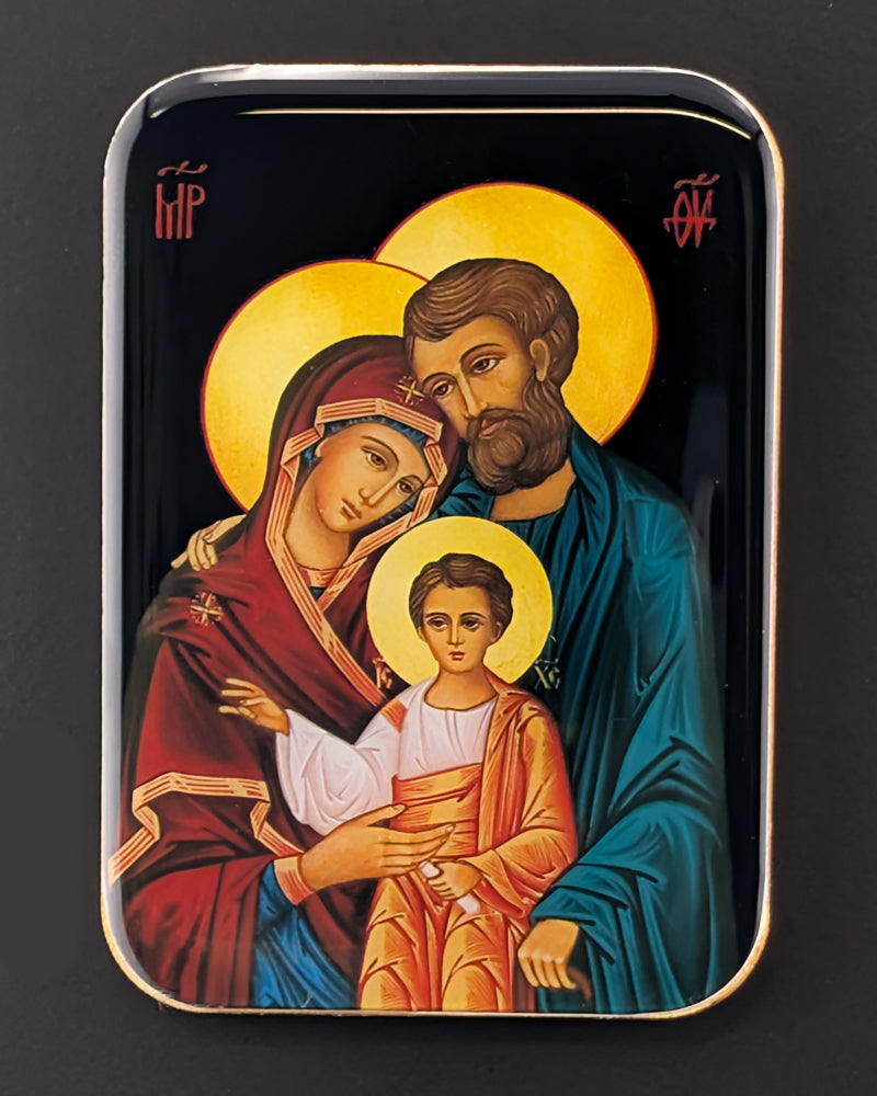 Byzantine-style Icon magnet of the Holy family with a dark background