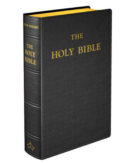 Black bound Bible with gold text on a white background