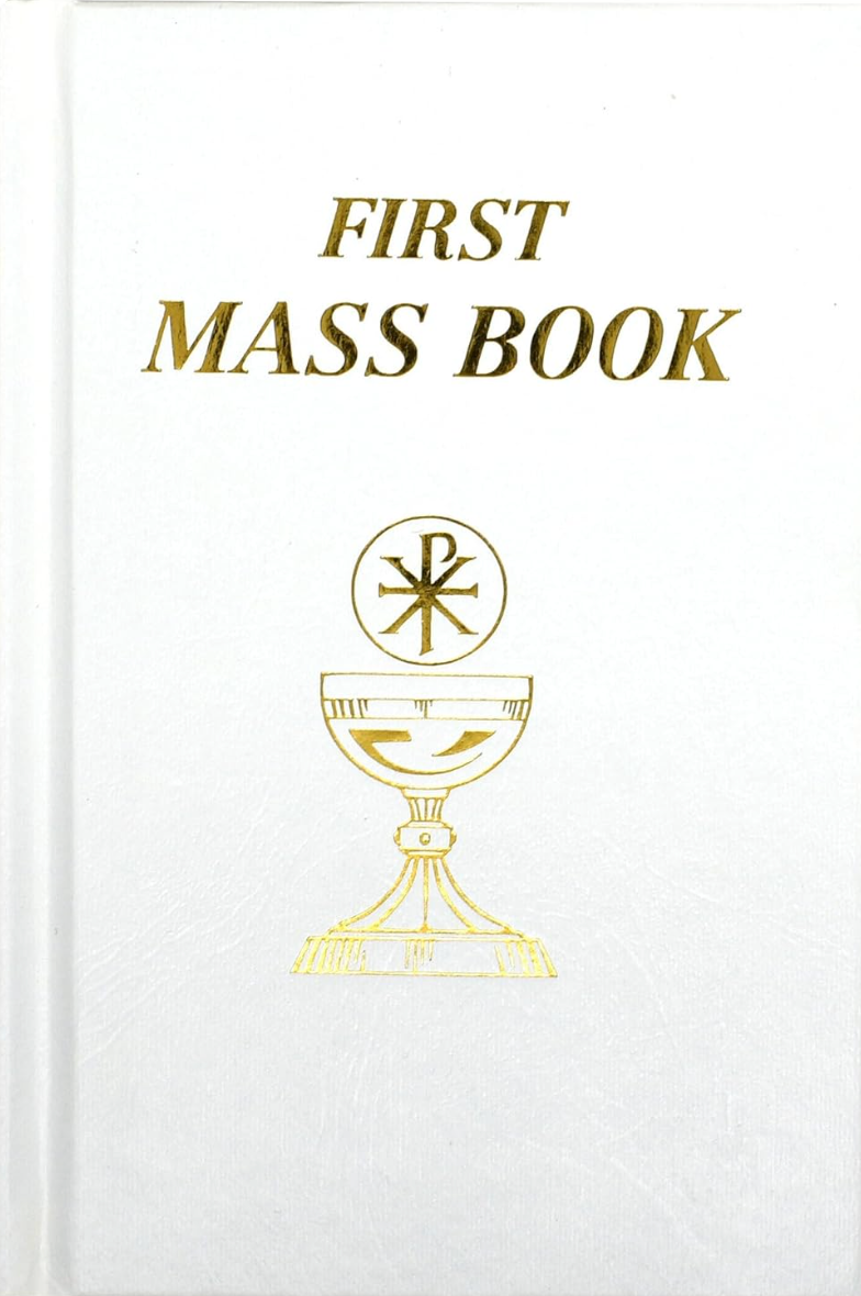 White book cover with gold text 'First Mass Book' and a chalice symbol on a white background