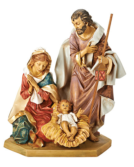 Nativity scene figurine with Mary, Joseph, and baby Jesus on a white background