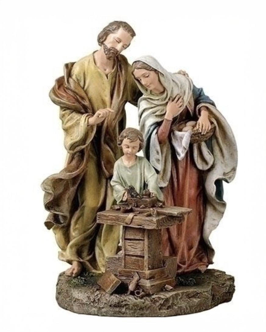 Statue of the Holy Family with a child at a well on a white background