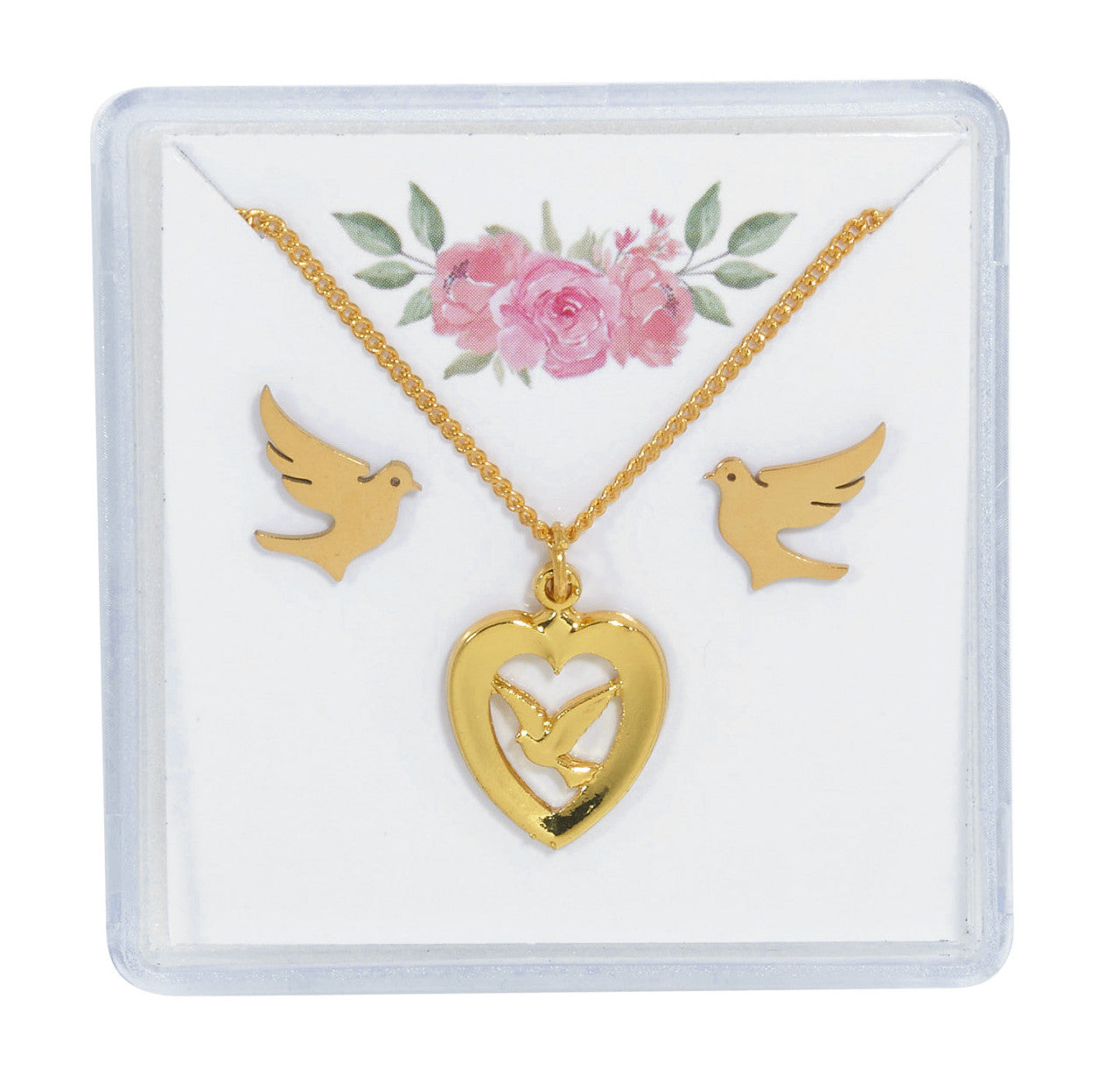 A gold tone necklace and earrings set with a dove and a heart with a cross pendant, presented on a card with floral design.