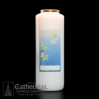 White candle with a blue label featuring white flowers on a black background