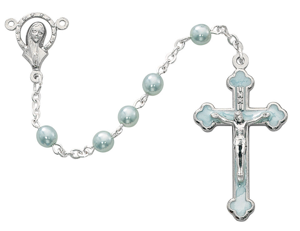 Rosary with light blue pearls and silver crucifix on a white background