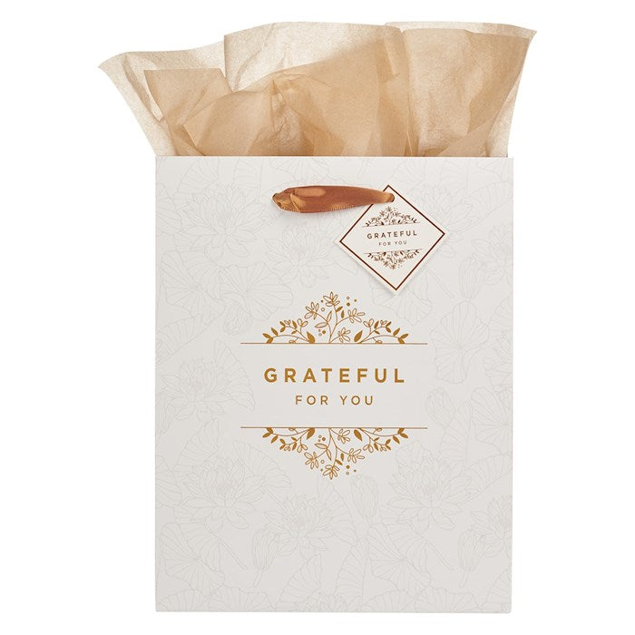 Gift bag with 'Grateful for You' text and decorative elements on a white background