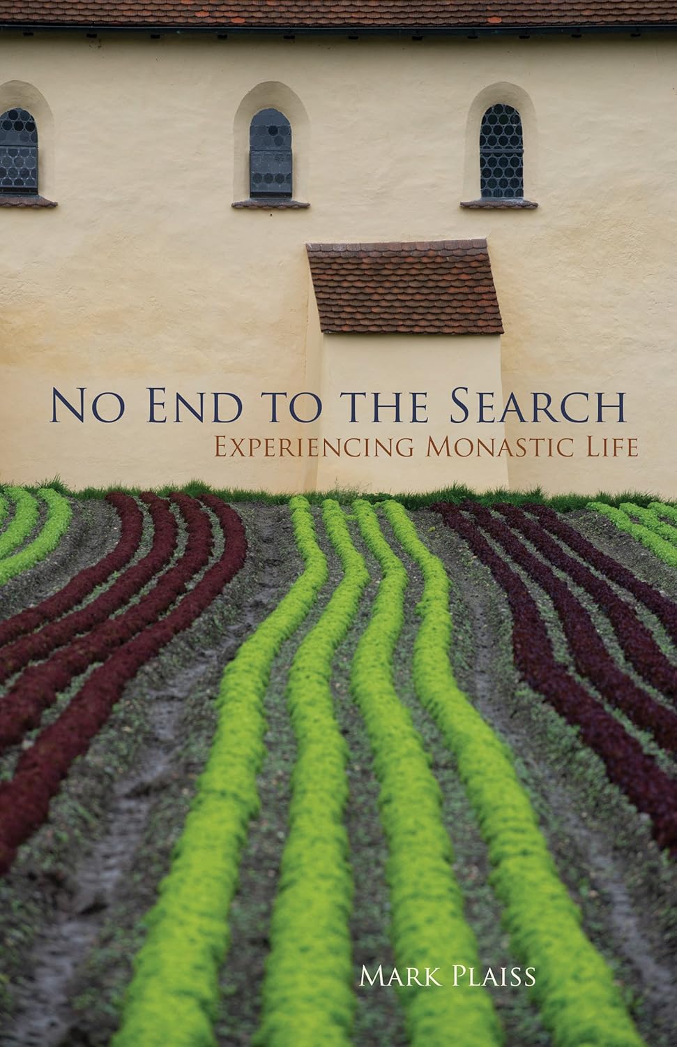 Book cover with a monastic building and colorful fields, featuring the title 'No End to the Search: Experiencing Monastic Life' by Mark Plaiss.