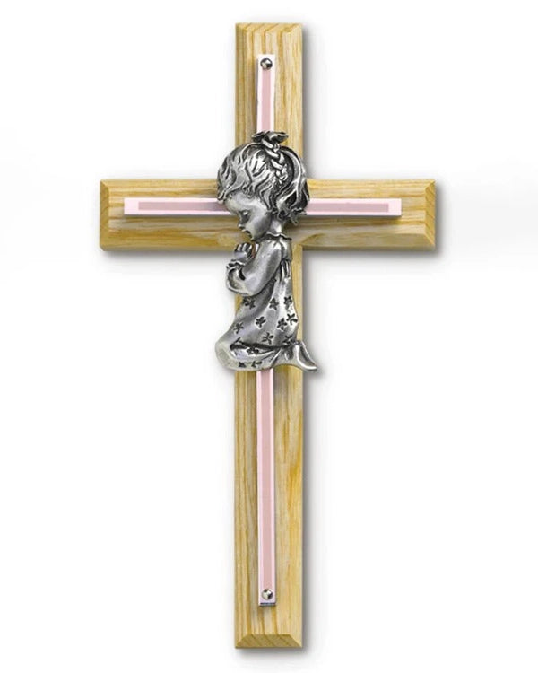 Wooden cross with a cherub figure on a white background