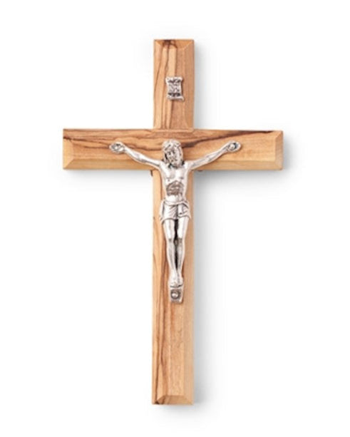 A wooden cross with a metal corpus, featuring an olive wood finish.