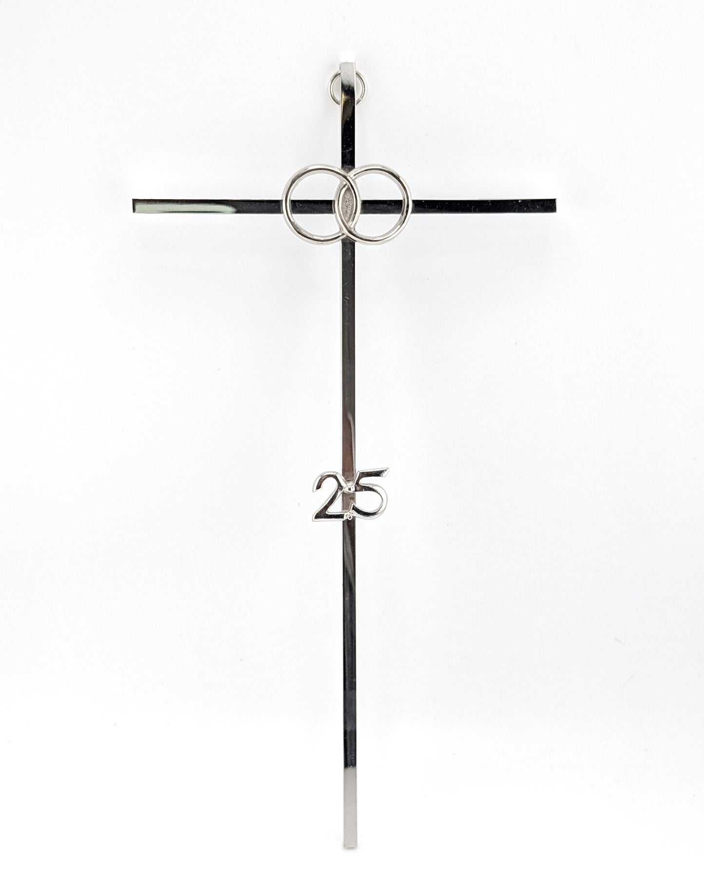 A minimalist silver metal wall cross featuring two interlocking rings at the center and the number '25' printed on the lower vertical arm, shown against a plain white background.