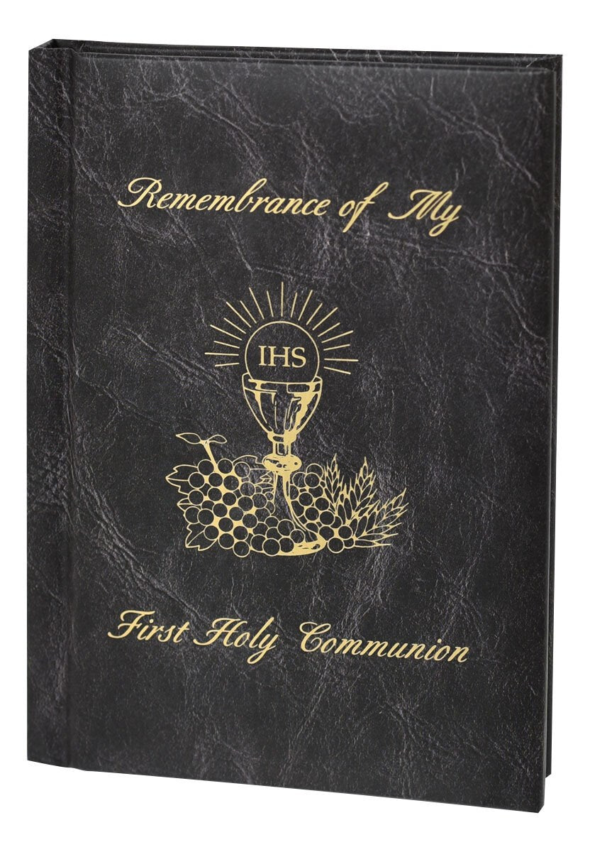 Black album with gold text and design for First Holy Communion