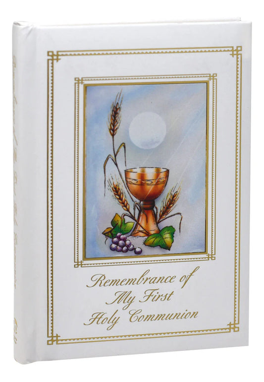 Book with religious design featuring a chalice, wheat, and grapes on a white background