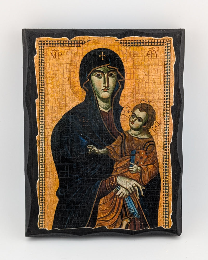 Icon of a religious figure holding a child on a white background