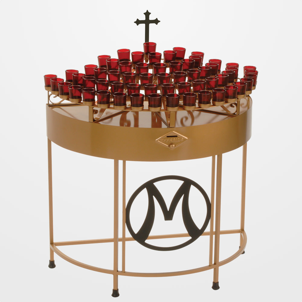 Decorative table with red candles, a cross, and a 'M' logo on a white background