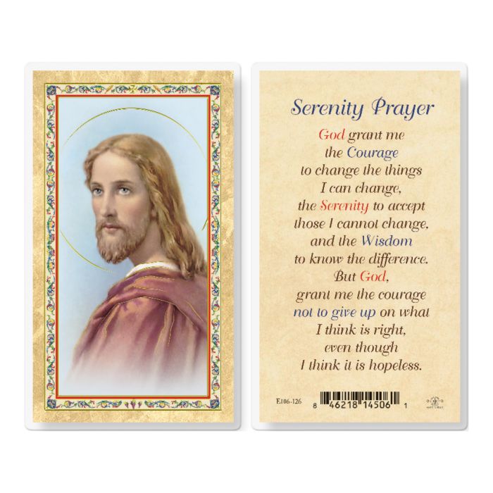 A laminated Italian holy card featuring the Serenity Prayer with gold accents and an image of Jesus Christ in the center.