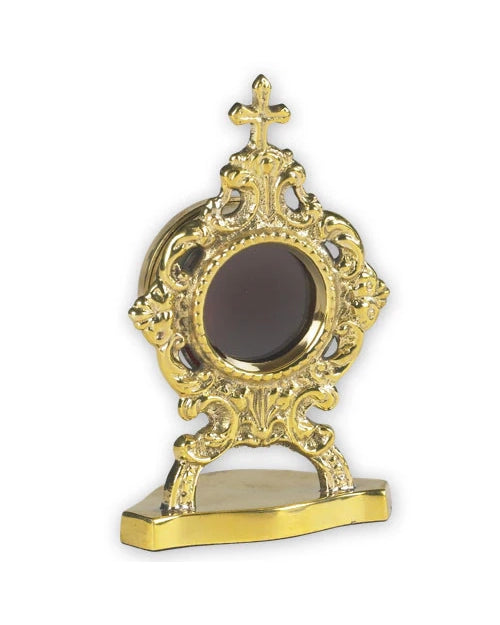 Decorative gold religious artifact on a white background