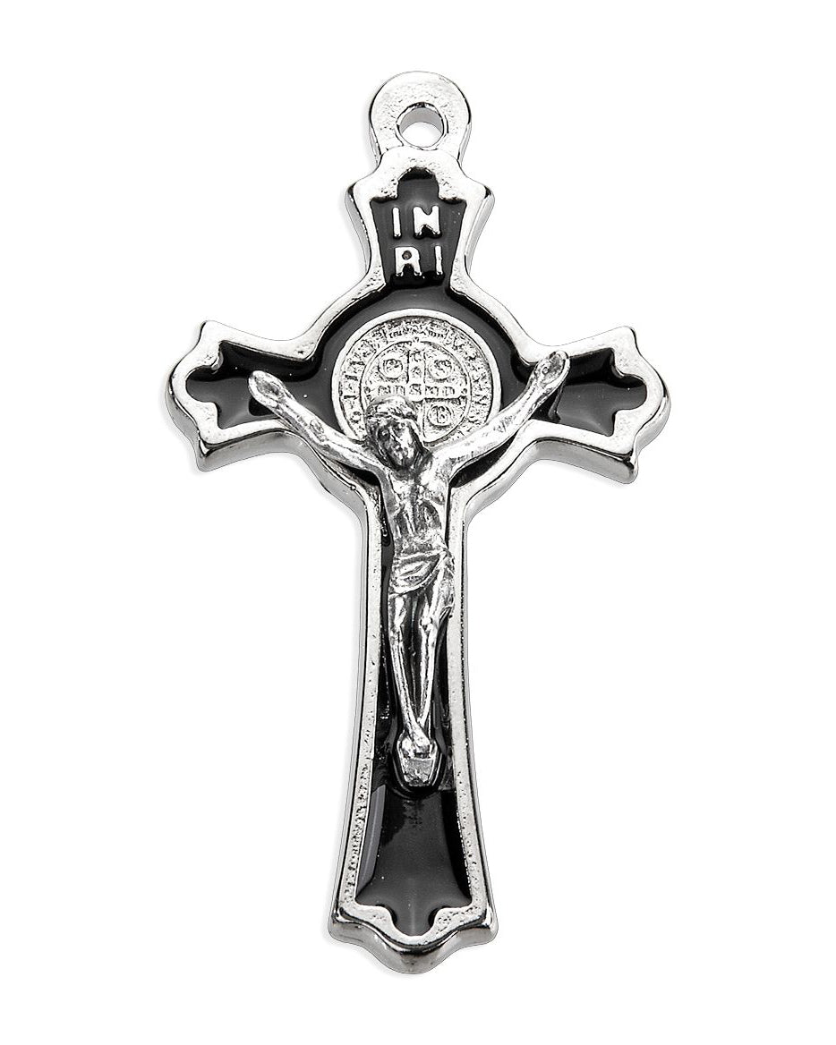 Silver crucifix pendant on a white background