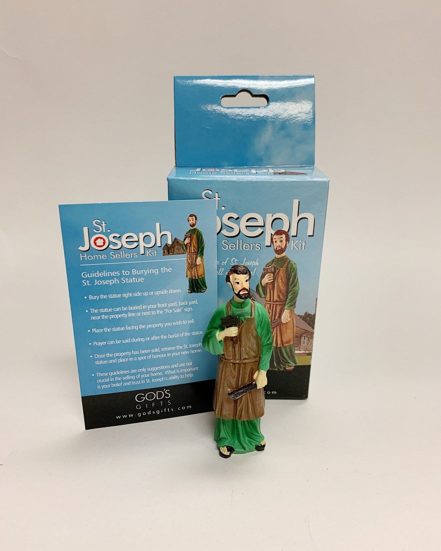 A St. Joseph Home Seller Kit including a prayer card, instructions, and a 3.25in plastic statue of St. Joseph