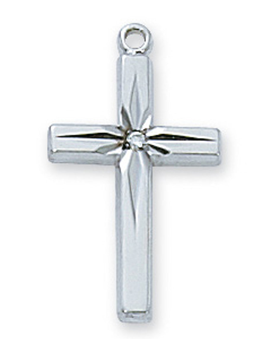 Silver cross pendant on a white background