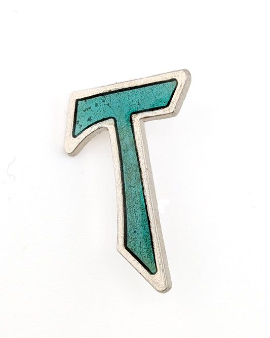 Metallic letter 'T' on a white background