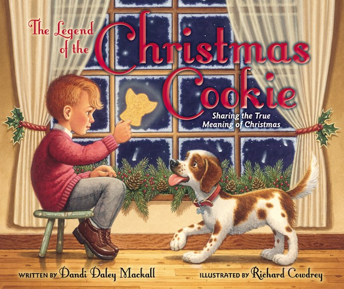 Book cover of 'The Legend of the Christmas Cookie' featuring an illustration of a child sitting on a stool next to a dog, looking out a window at a Christmas tree and decorations.