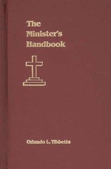 The cover of 'The Minister's Handbook' by Orlando L. Tibbetts, featuring a burgundy background with gold text and a cross emblem.