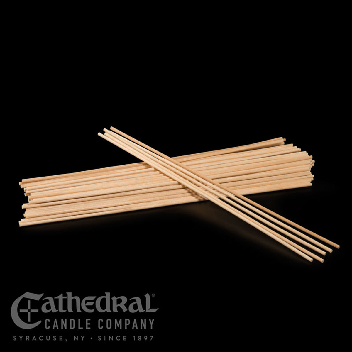 Bamboo reed diffusers on a black background with Cathedral Candle Company logo.