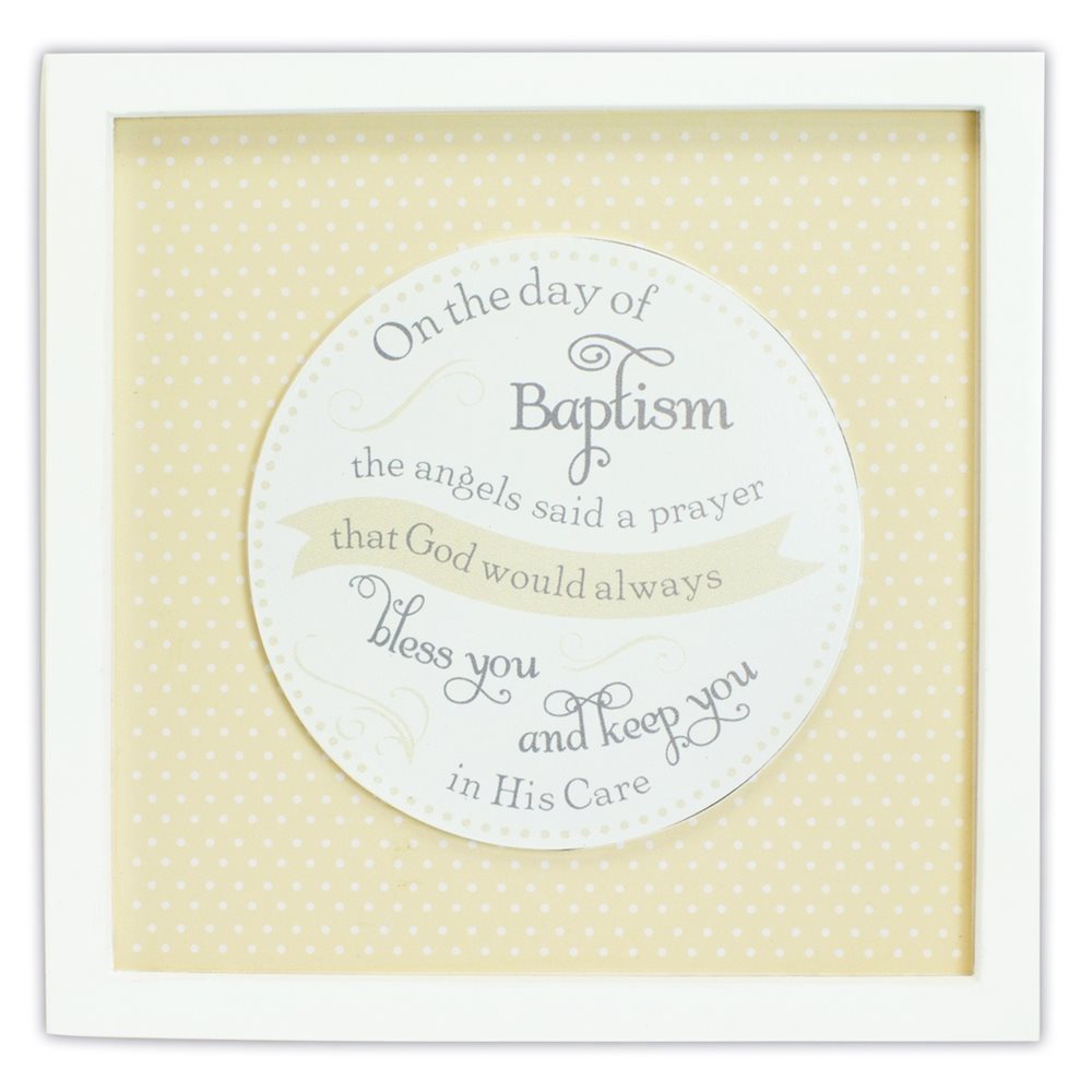 A wooden plaque with a polka dot border, featuring text that reads 'On the day of Baptism the Angels said a Prayer' followed by a blessing and a quote.