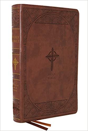 A brown leathersoft cover of the New American Bible, Revised Edition, with the title and cross design embossed on the front.