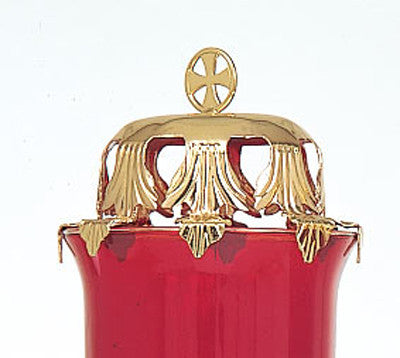 A gold-plated lamp top with a cross, likely a part of church supplies.