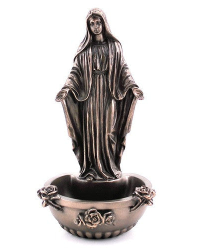 Bronzed resin statue of Our Lady of Grace standing with a rosary in her hand, used as a holy water font or a decorative piece.