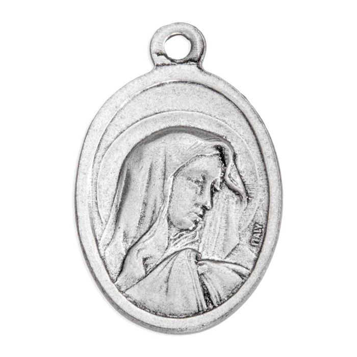 An oval silver-toned religious medal pendant featuring a profile portrait of the Virgin Mary, shown on a plain white background.