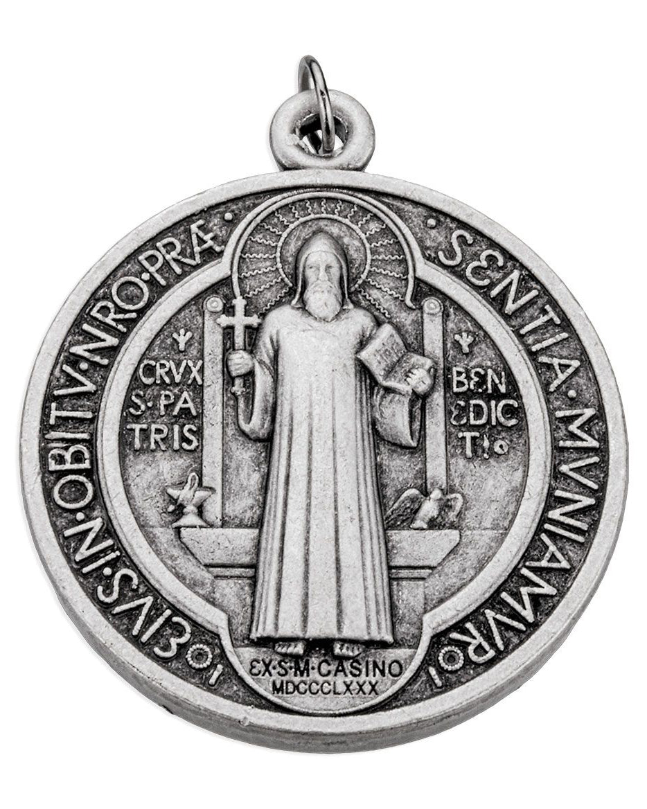 Silver medal with religious figure and inscriptions on a white background
