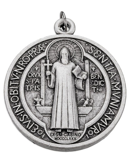 Silver medal with religious figure and inscriptions on a white background
