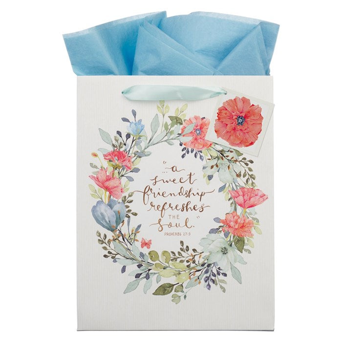 Floral design gift bag with text on a white background